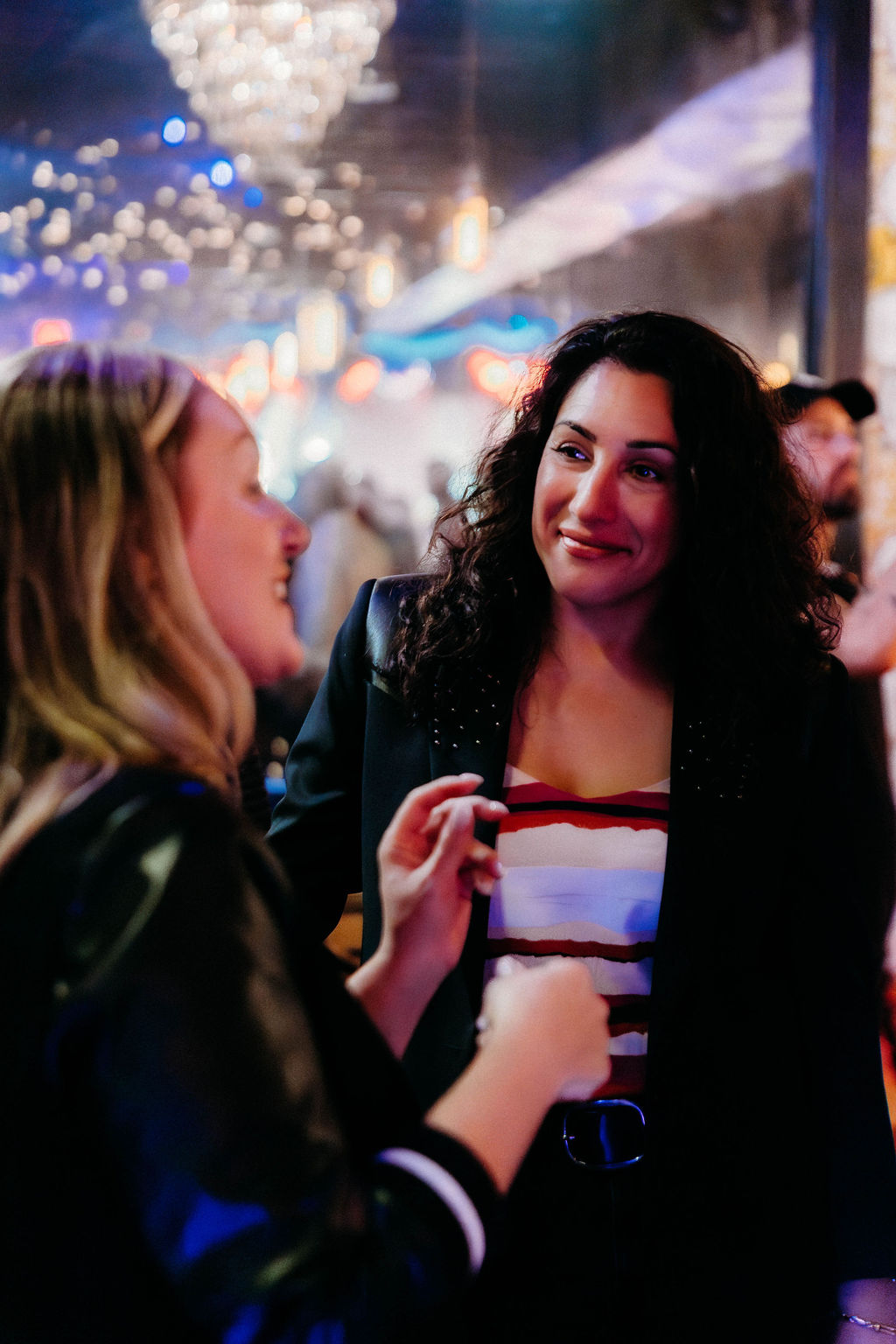 Two attendees deep in conversation at a Connect or Die activation